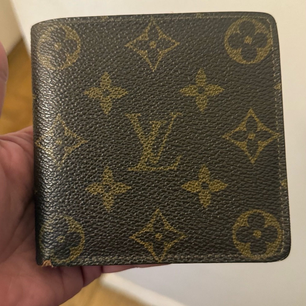 Louis Vuitton Monogram Coated Canvas Bifold Wallet used “Authentic” with COA